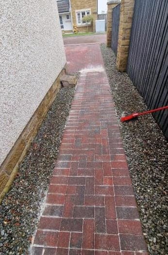 Narrow side path, cleaned by Steam King